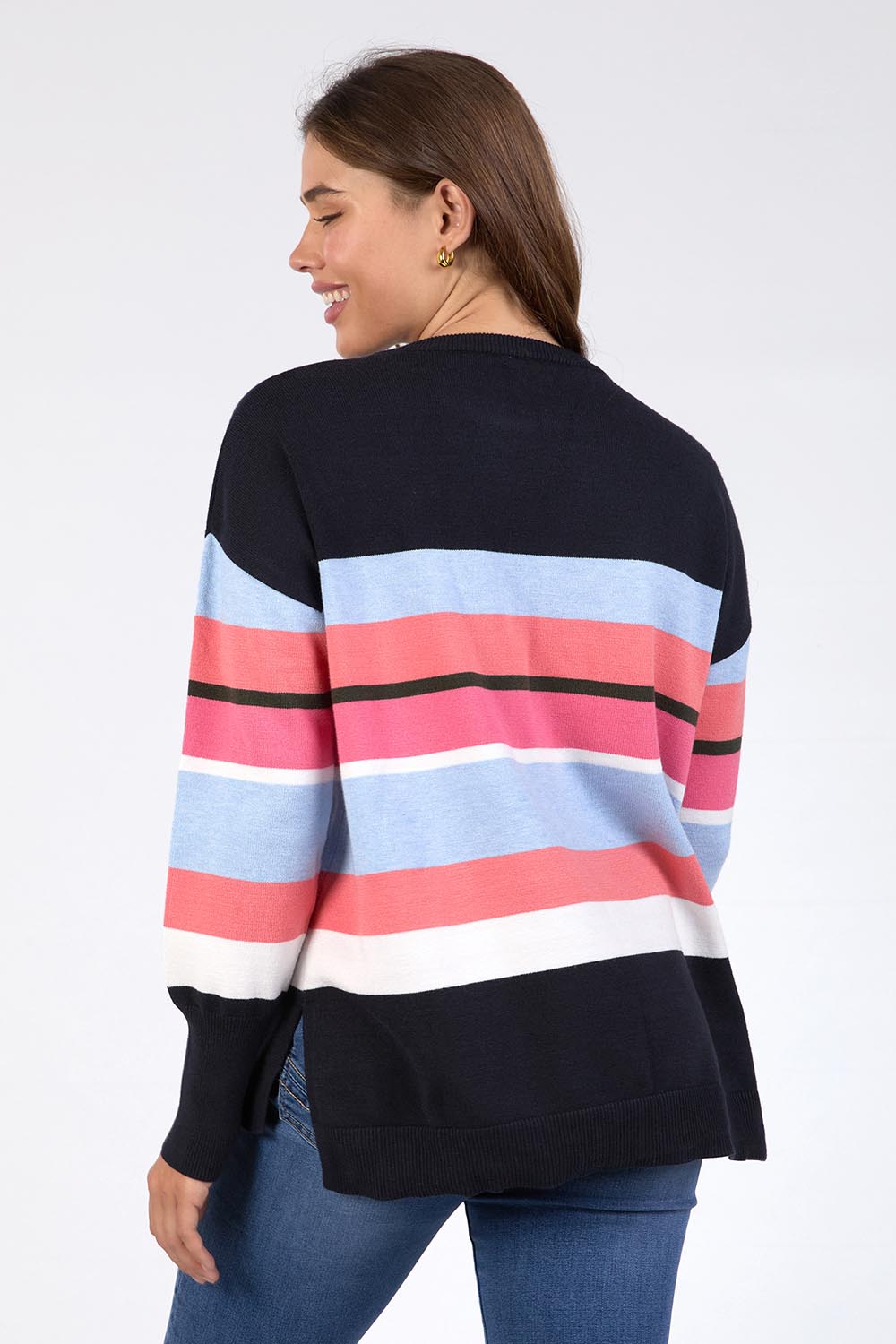 A model wearing the Lacey Stripe Knit in colour Navypink, from the back
