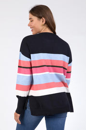A model wearing the Lacey Stripe Knit in colour Navypink, from the back