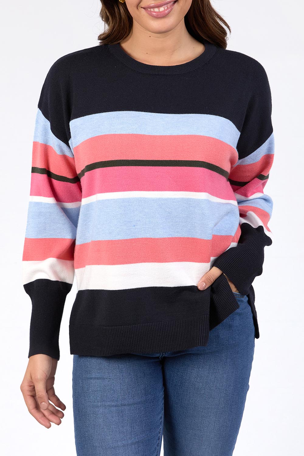 A model wearing the Lacey Stripe Knit in colour Navypink, from the front, cropped image