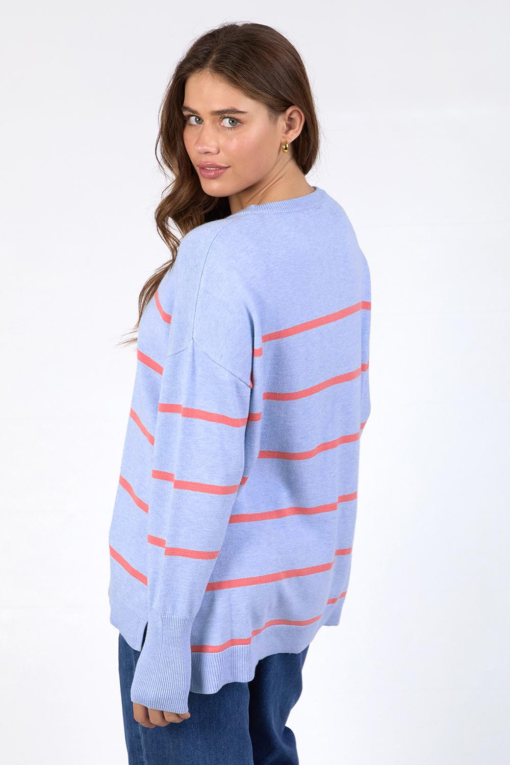 A model wearing the Charli Stripe Knit in colour Skyblue, from the back
