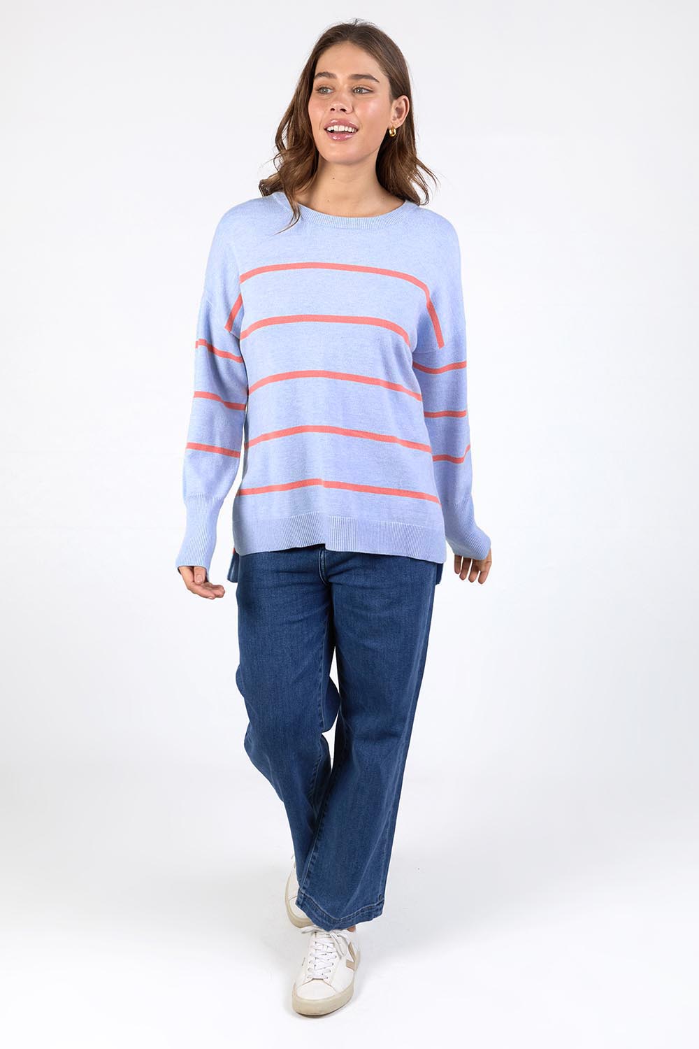A model wearing the Charli Stripe Knit in colour Skyblue, from the front, showing the whole outfit