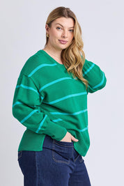 Model Genericm wearing size sample of the Charli Stripe Knit – Virdisgree in colour Virdisgree, from an angle