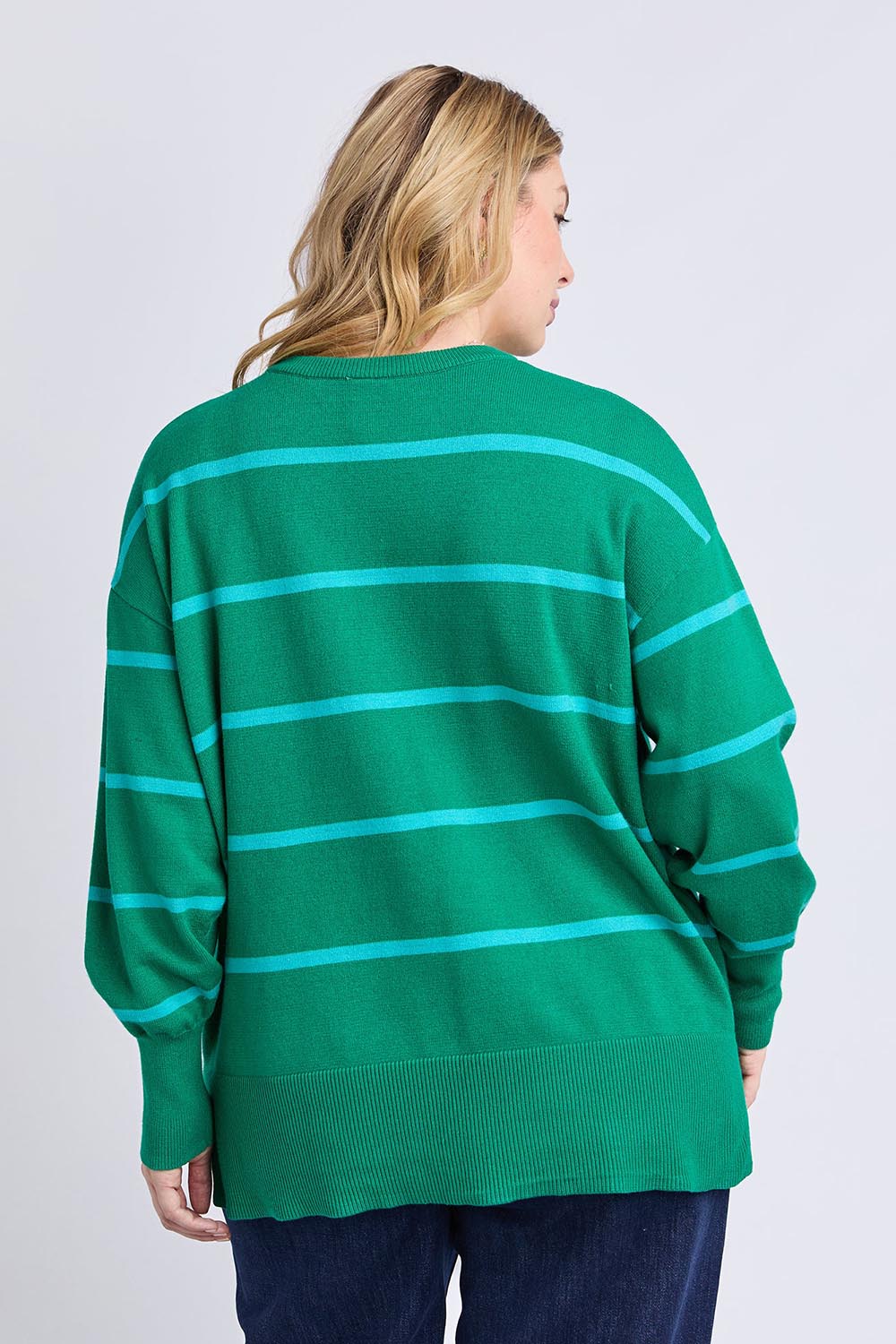 Model Genericm wearing size sample of the Charli Stripe Knit – Virdisgree in colour Virdisgree, from the back