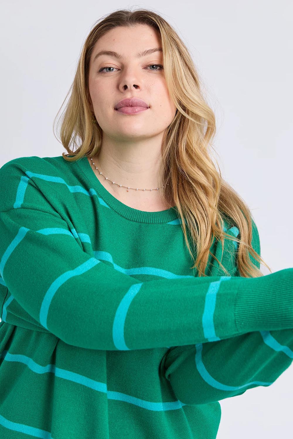 Model Genericm wearing size sample of the Charli Stripe Knit – Virdisgree in colour Virdisgree, in a cropped view