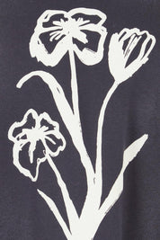 Product shot of the Tulip Cotton Crew in colour Washblack (Black), detail