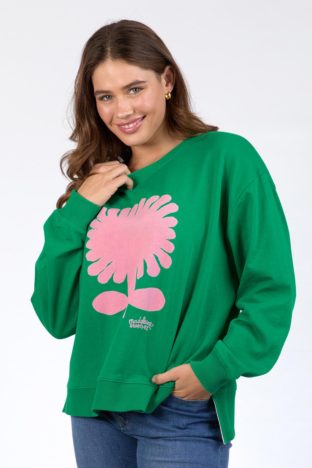 A model wearing the Madeleine Stamer II Cotton Crew in colour Pinegreen (Green), from the front, cropped image