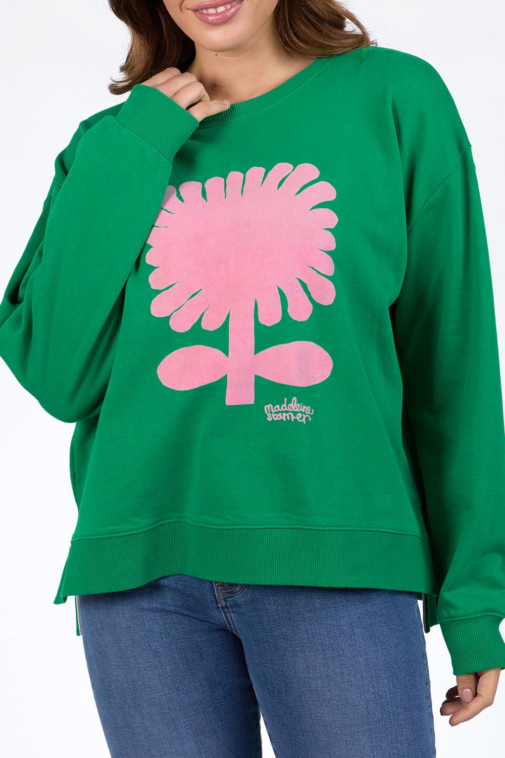 A model wearing the Madeleine Stamer II Cotton Crew in colour Pinegreen (Green), from the front, cropped image