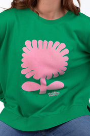 A model wearing the Madeleine Stamer II Cotton Crew in colour Pinegreen (Green), from the front, cropped image