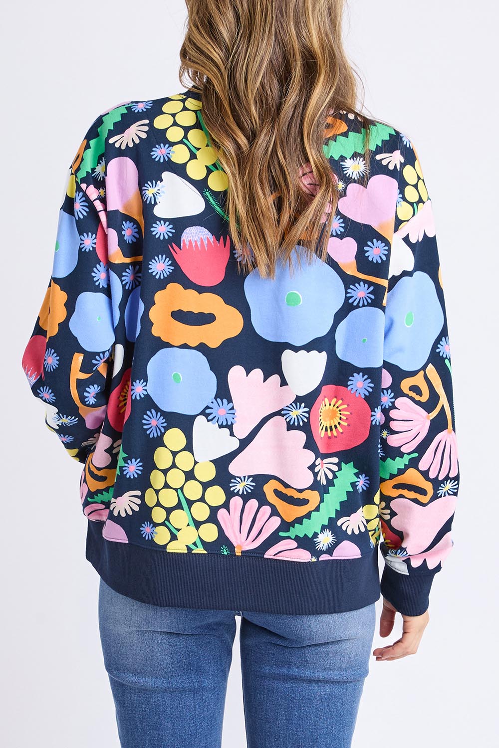 A model wearing the Flower Medley Cotton Crew in colour Multiflora, from the back