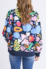 A model wearing the Flower Medley Cotton Crew in colour Multiflora, from the back