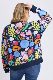 A model wearing the Flower Medley Cotton Crew in colour Multiflora, from the back