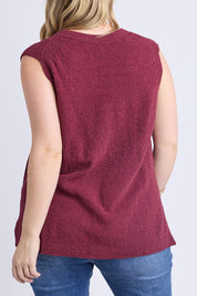 A model wearing the Bowie Cotton Blend Knit Vest in colour Plum (Red), from the back
