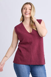 A model wearing the Bowie Cotton Blend Knit Vest in colour Plum (Red), from the front, cropped image
