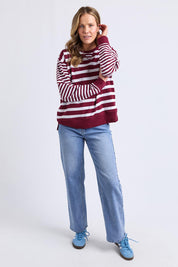 A model wearing the All Sorts Cotton Crew in colour Plum (Red), from the front, showing the whole outfit