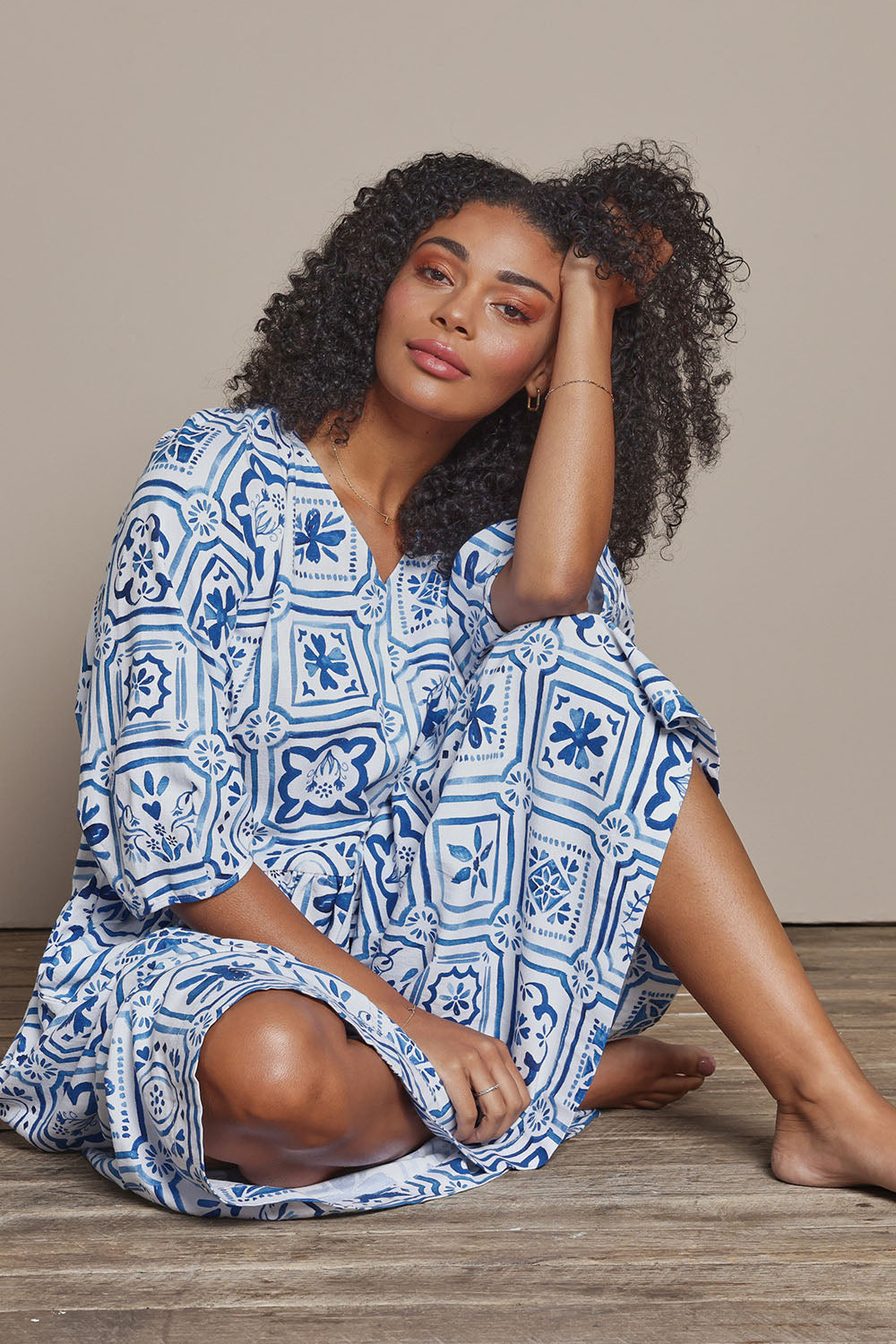 Model Ziara wearing size 10 of the Dolce Tile Cotton Blend Midi Dress in colour Oceantile (Blue), from the front, cropped image