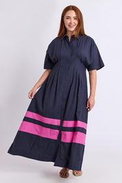 Model Genericm wearing size sample of the Scarlett Dress – Magentastr in colour Magentastr, from the front