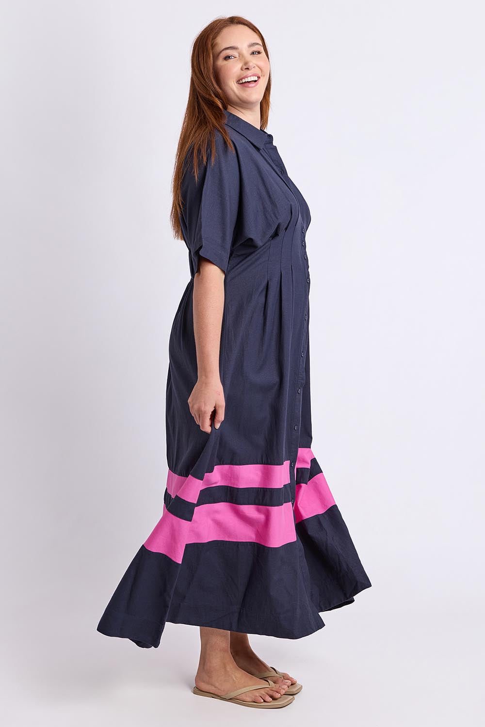 Model Genericm wearing size sample of the Scarlett Dress – Magentastr in colour Magentastr, from the front