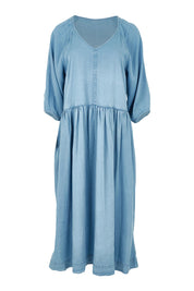 Product shot of the Sawyer Chambray Dress in colour Midblue (Blue), from the front