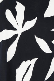 Product shot of the Mimosa Cotton Tee in colour Blackprint (Black), detail