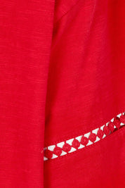 Product shot of the Abigail Cotton Top in colour Poppy (Red), detail