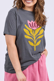A model wearing the Fiore Cotton Linen Tee in colour Charcoal (Grey), from the front, cropped image