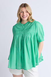 A model wearing the Monty Cotton Short Sleeve Shirt in colour Gumdrop (Green), from the front, cropped image