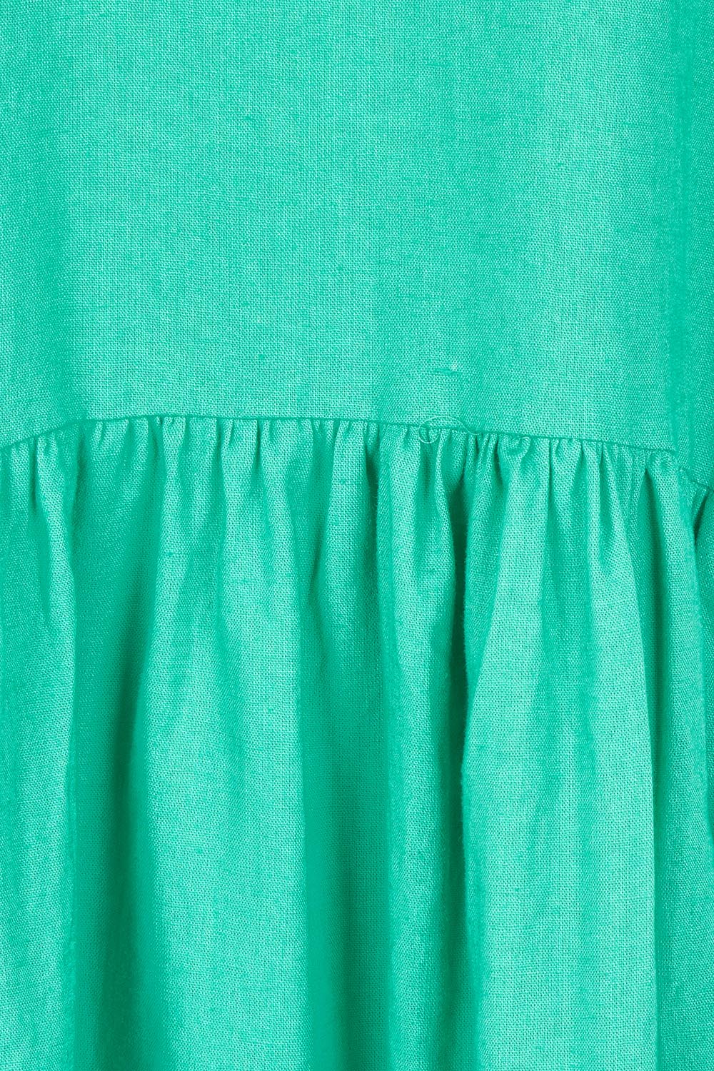 Product shot of the Sunset Hour Linen Blend Dress in colour Gumdrop (Green), detail