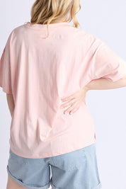 A model wearing the Sardinia Cotton Tee in colour Lightpink (Pink), from the back