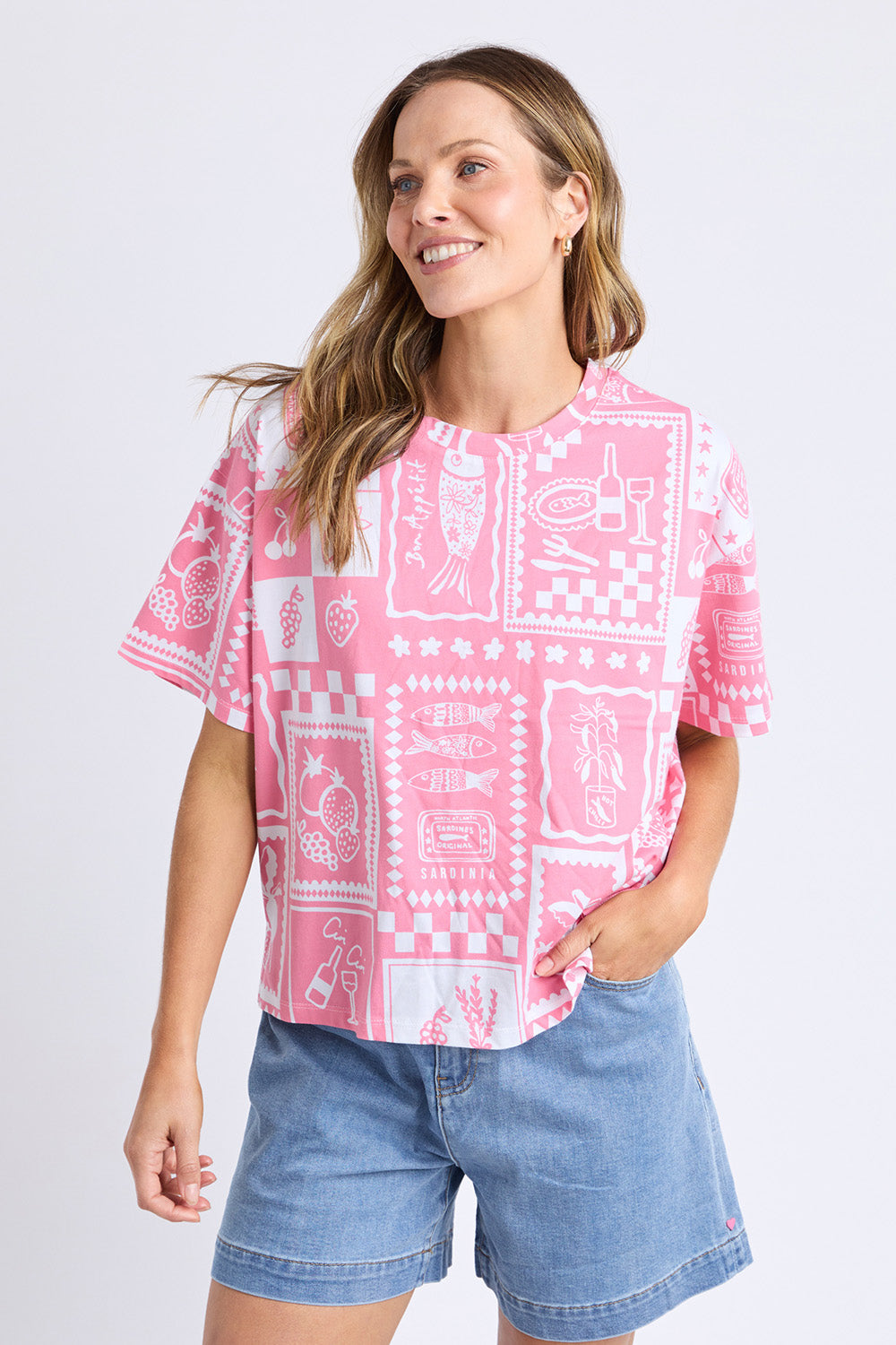 A model wearing the Chin Chin Cotton Tee in colour Print (Blue), from the front, cropped image
