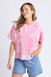 A model wearing the Chin Chin Cotton Tee in colour Print (Blue), from the front, cropped image