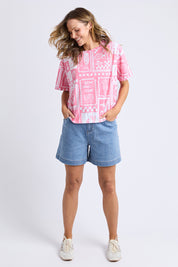 A model wearing the Chin Chin Cotton Tee in colour Print (Blue), from the front, showing the whole outfit