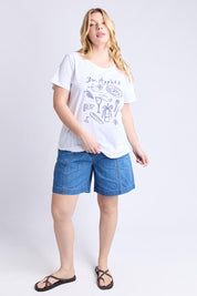 A model wearing the Bon Appetit Cotton Tee in colour White (White), from the front, showing the whole outfit