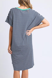 A model wearing the Sabrina Cotton Dress in colour Navywhite, from the back