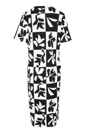 Product shot of the Splice Cotton Dress in colour Blackwhite, from the back