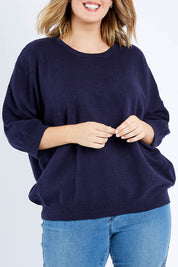 Model Jess wearing size 14 of the Elsie Knit in colour Dsapphire (Blue), from the front, cropped image
