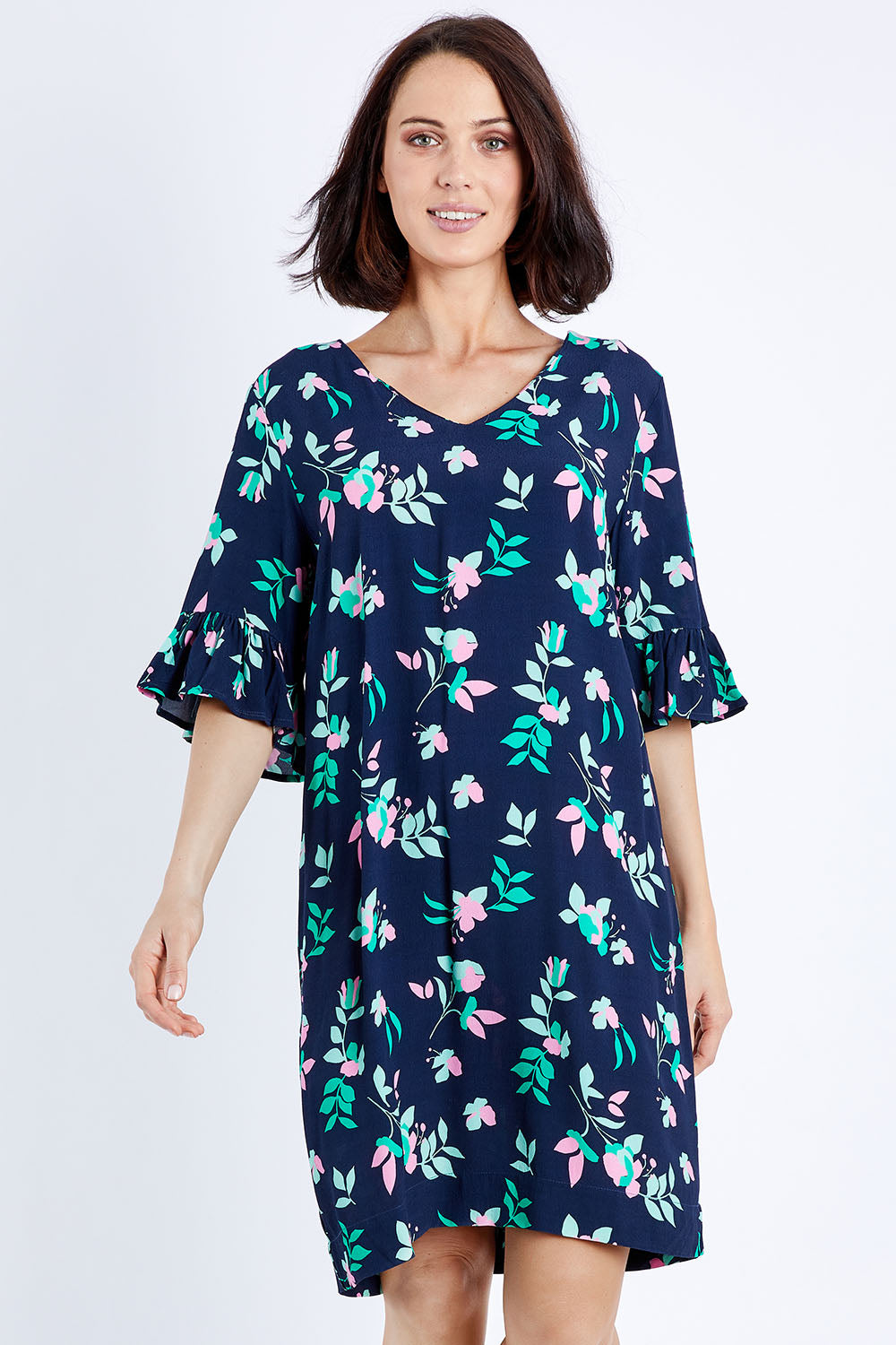 Model Andrea wearing size 10 of the Magnolia Shift Dress in colour Navy (Blue), from the front, cropped image