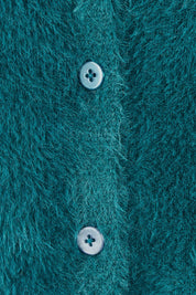 Product shot of the Paris Cardigan in colour Teal (Green), detail