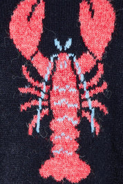 Product shot of the Lobster Intersaid Knit in colour Navy (Blue), detail