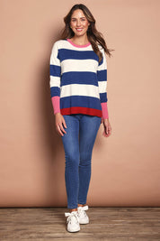 Model Madeline wearing size S of the Elvie Block Stripe Knit in colour Navystripe, from the front, showing the whole outfit