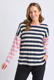 A model wearing the Gaeb Stripe Cotton Long Sleeve Tee in colour Whitenavy, from the front, cropped image
