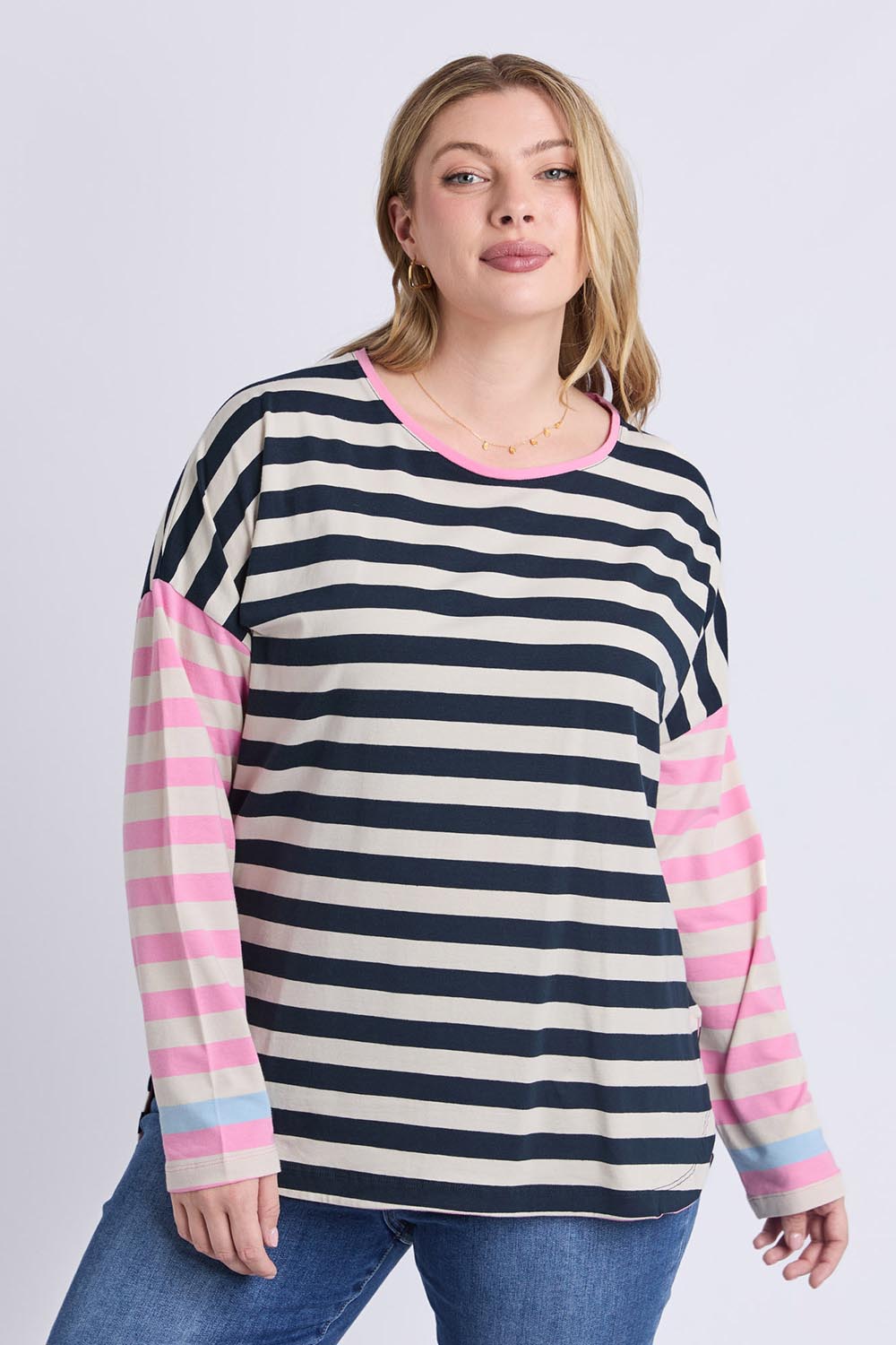 A model wearing the Gaeb Stripe Cotton Long Sleeve Tee in colour Whitenavy, from the front, cropped image