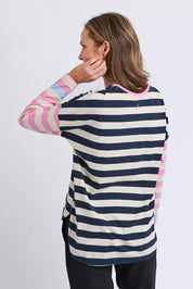 A model wearing the Gaeb Stripe Cotton Long Sleeve Tee in colour Whitenavy, from the front, cropped image