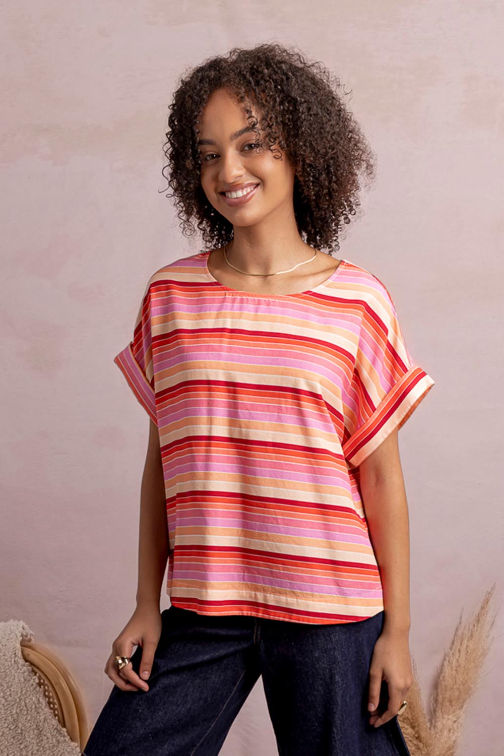 Model Genericm wearing size sample of the Sunset Tee – Multi in colour Multi, in a cropped view