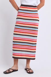 Model Genericm wearing size sample of the Retro Reef Knit Skirt – Multi in colour Multi, in a cropped view