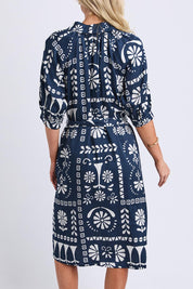 Model Genericm wearing size sample of the Jenny Dress – Navy in colour Navy, from the back