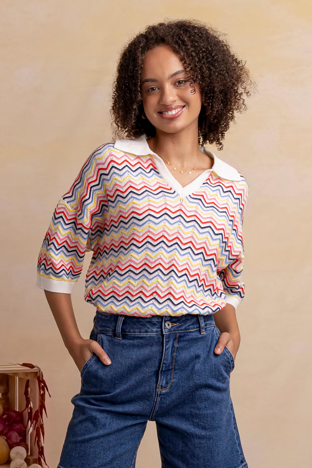 Model Genericm wearing size sample of the Market Morning Knit Polo – Multistrip in colour Multistrip, in a cropped view