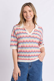 Model Genericm wearing size sample of the Market Morning Knit Polo – Multistrip in colour Multistrip, in a cropped view