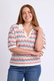 Model Genericm wearing size sample of the Market Morning Knit Polo – Multistrip in colour Multistrip, in a cropped view