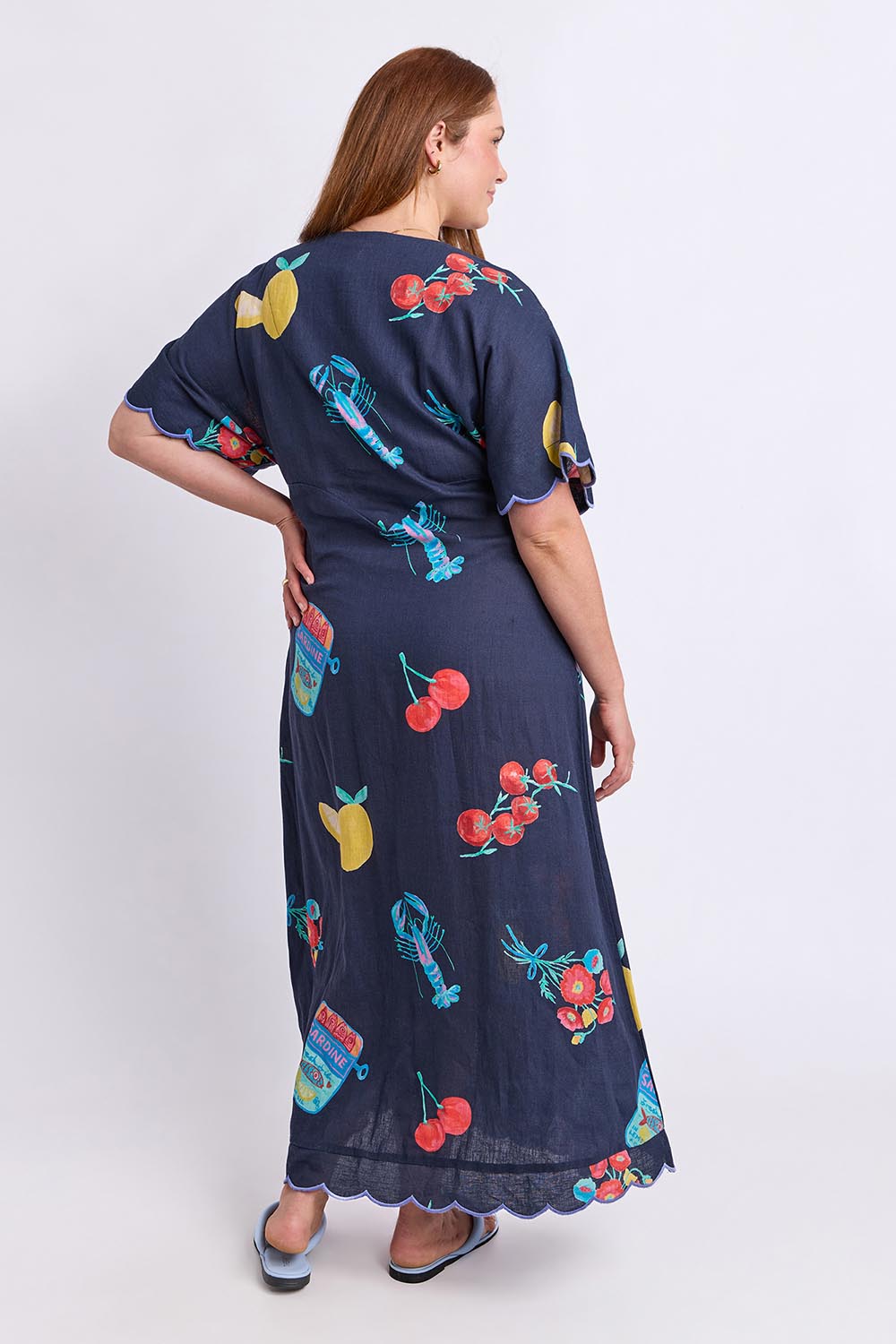 Model Genericm wearing size sample of the Market Dress – Navymarket in colour Navymarket, from the front