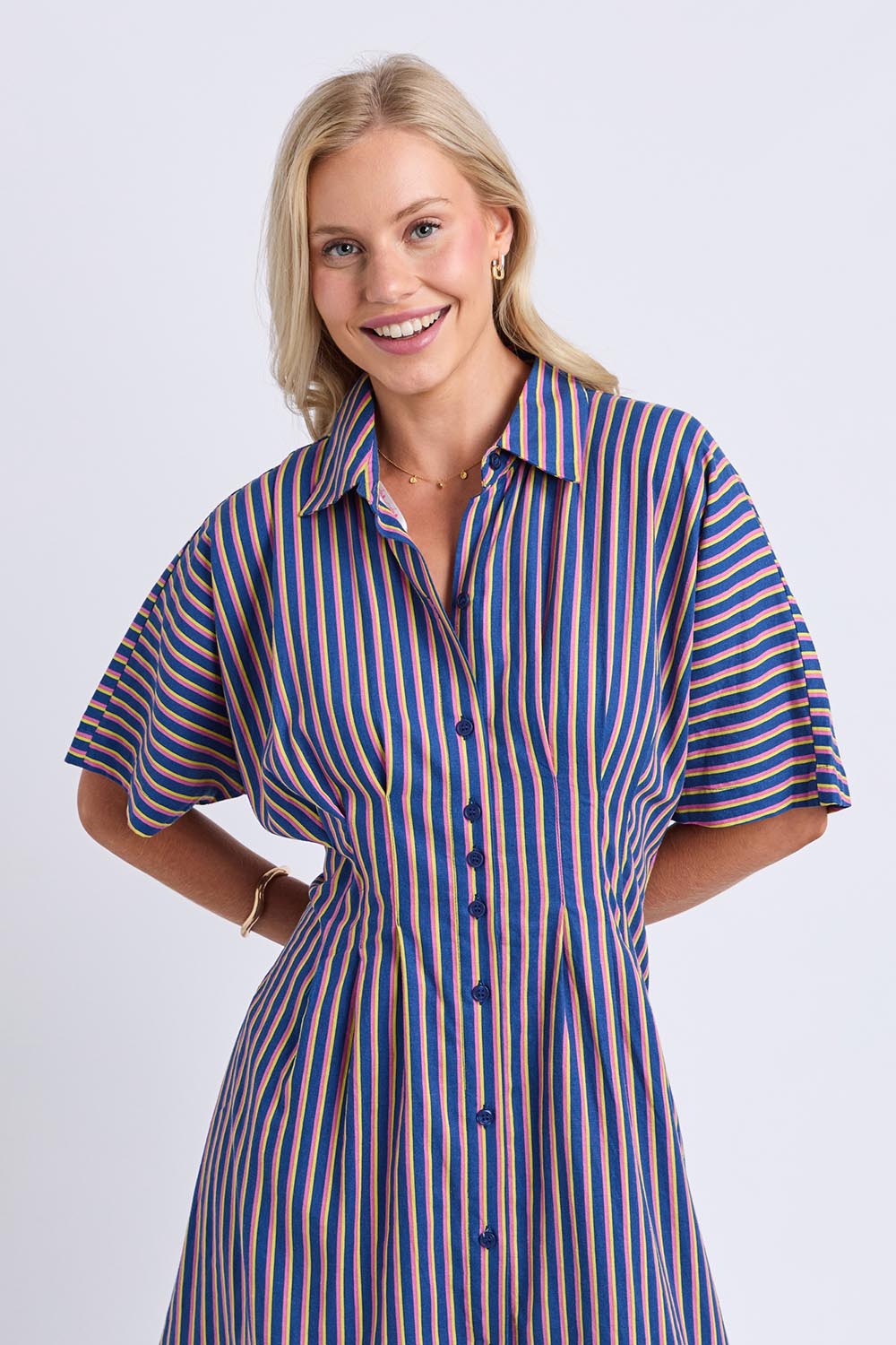 Model Genericm wearing size sample of the Samba Dress – Chinablue in colour Chinablue, in a cropped view